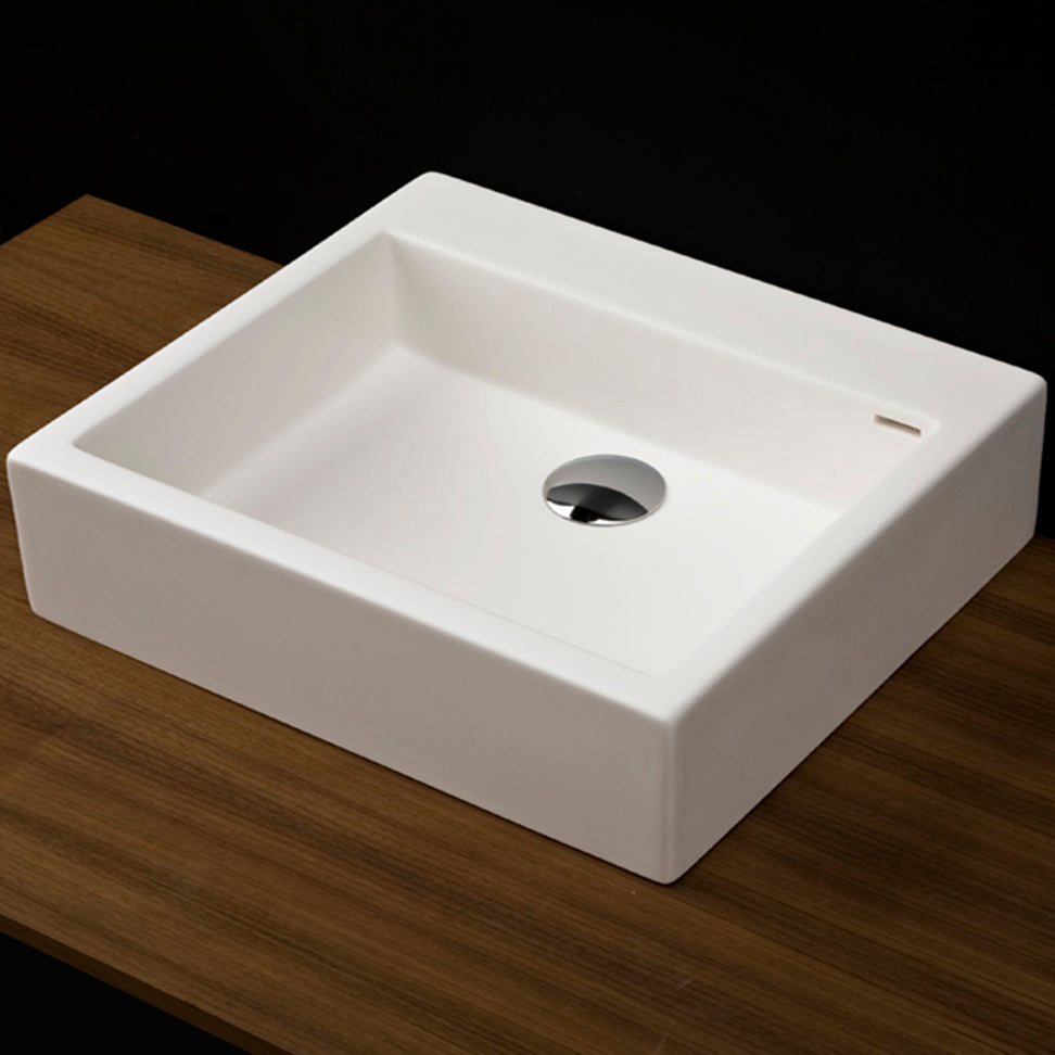 Lacava - Vessel Bathroom Sink Made Of Solid Surface, With An Overflow.Finished Back. Available With 00 - No Faucet Holes, 01 - One Faucet Hole, 02 - Two Faucet Holes, 03 - Three Faucet Holes In 8" Spread. W: 22” D: 15”H: 6 1/8”